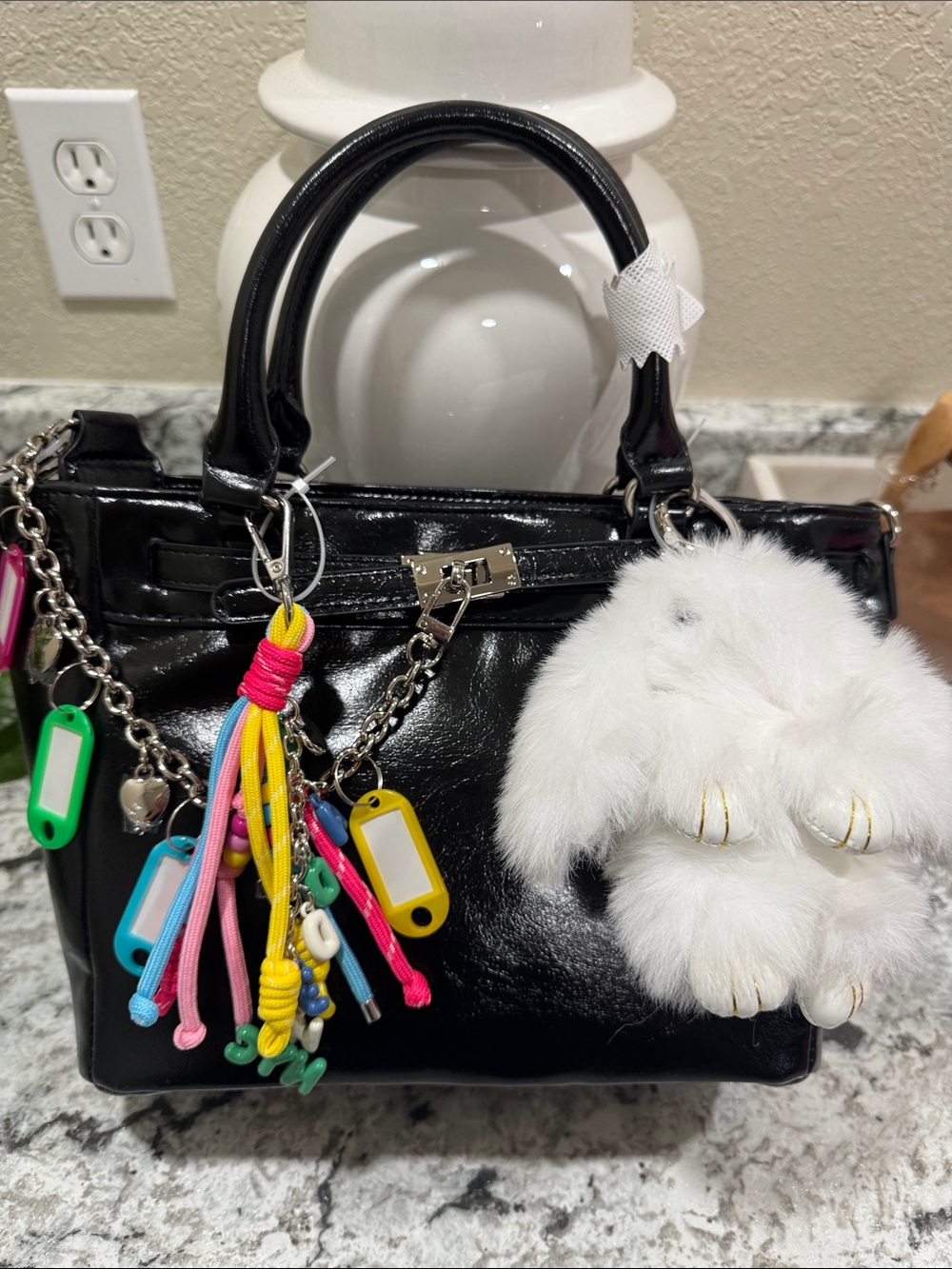 Kids Black Patent Handbag with Colorful Tassel Charms and White Bunny Pom